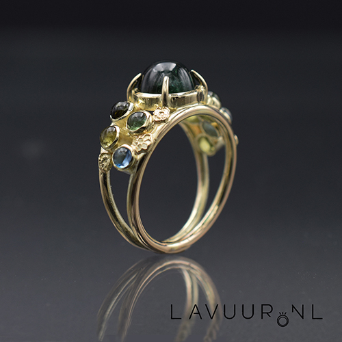 gouden ring met toermalijnen en topaas